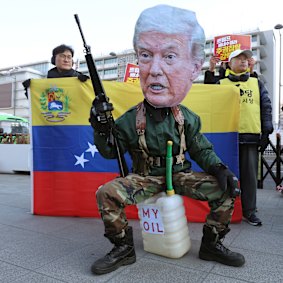 South Korean protesters criticise the US attack on Venezuela.