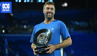 Australian Open One Point Slam winner Jordan Smith beats professional tennis players to take home $1 million