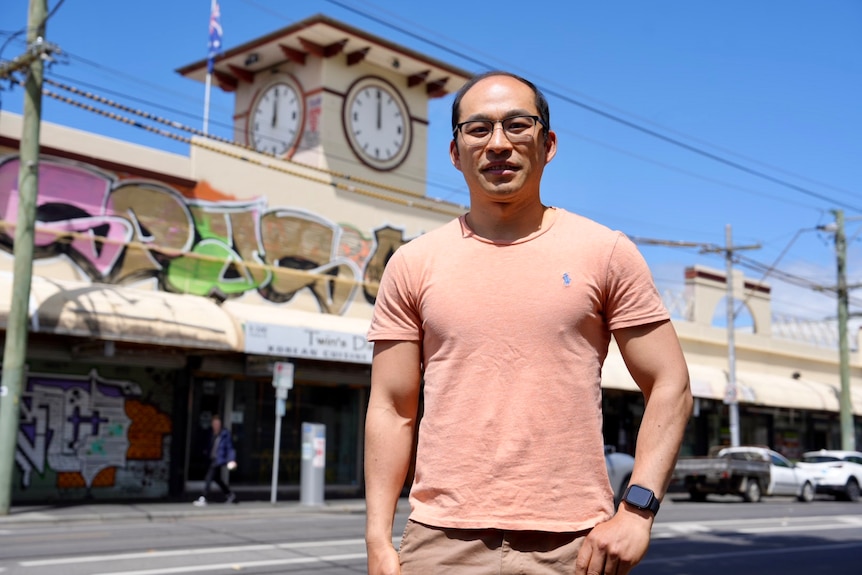 Andrew Phu outside the clock tower on Victoria Street in Richmond