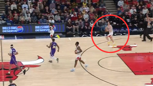 Josh Giddey seen preparing to make a 75ft shot.