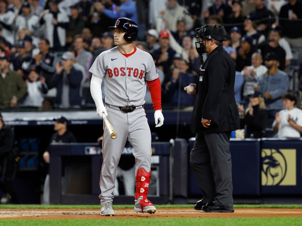 Boston Red Sox player Alex Bregman reacts after striking out in a game against the New York Yankees.