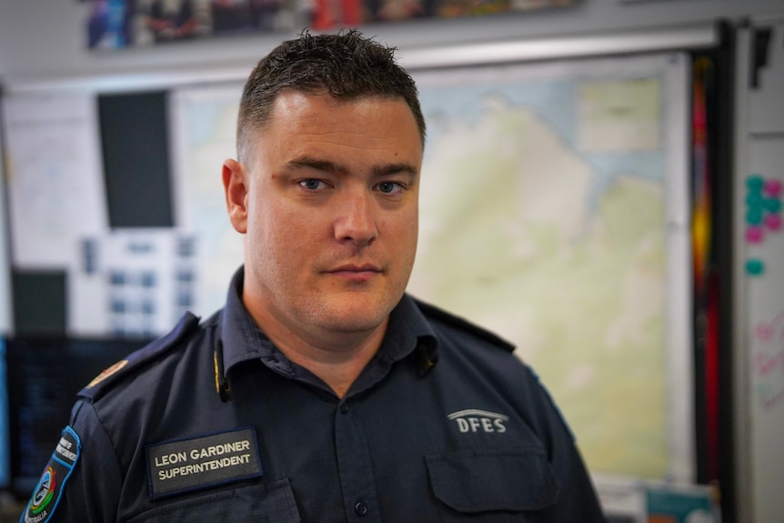 Man in uniform brown hair.