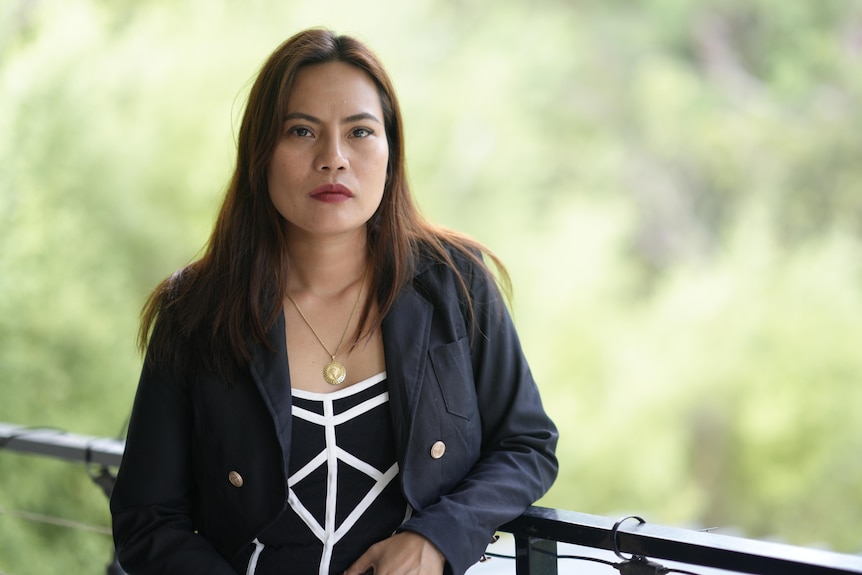 A woman with long hair.