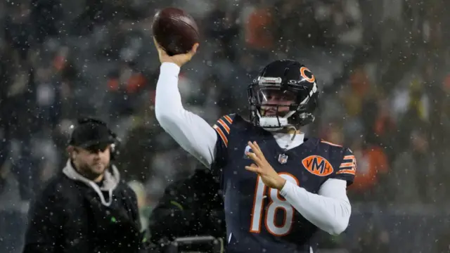 Chicago Bears quarterback Caleb Williams warms up before playing the Green Bay Packers in the 2025 NFL play-offs