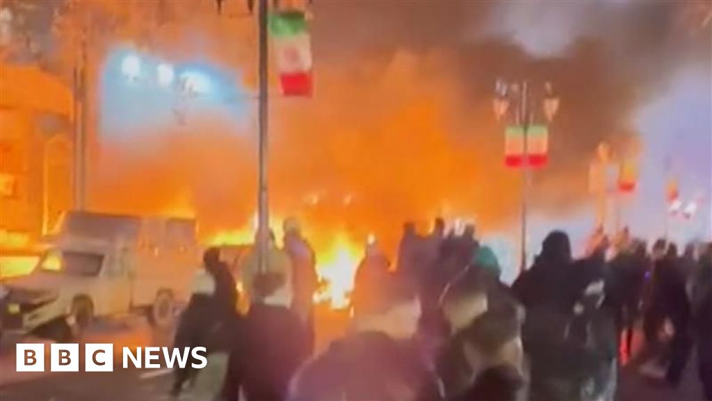Buildings in Tehran set on fire as demonstrations spread across Iran