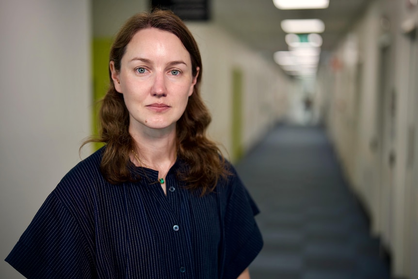 Dr Rebekah Young in a hospital corridor