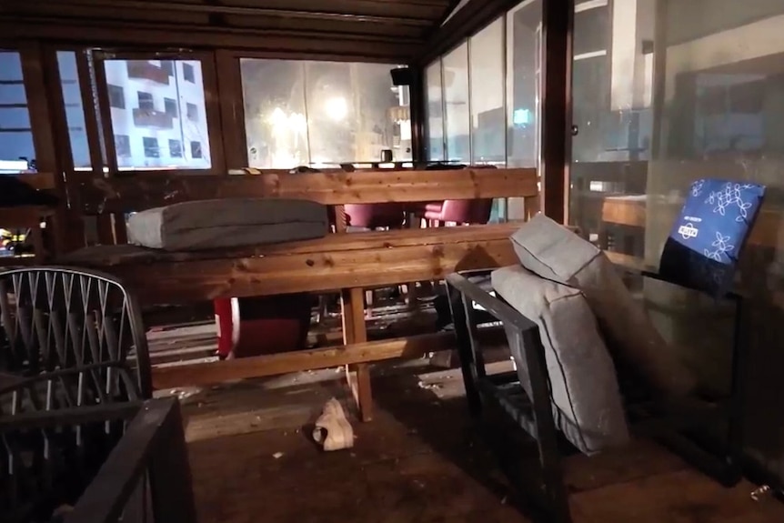 The interior of a damaged building