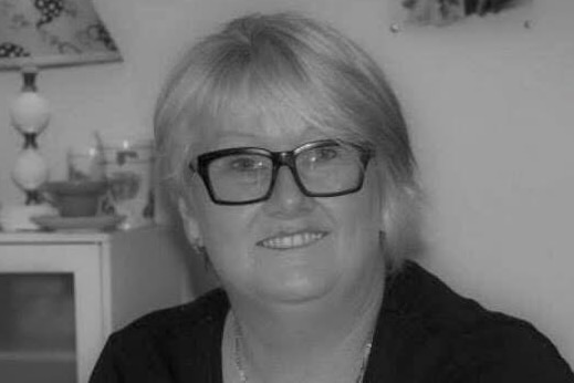 A woman with glasses 