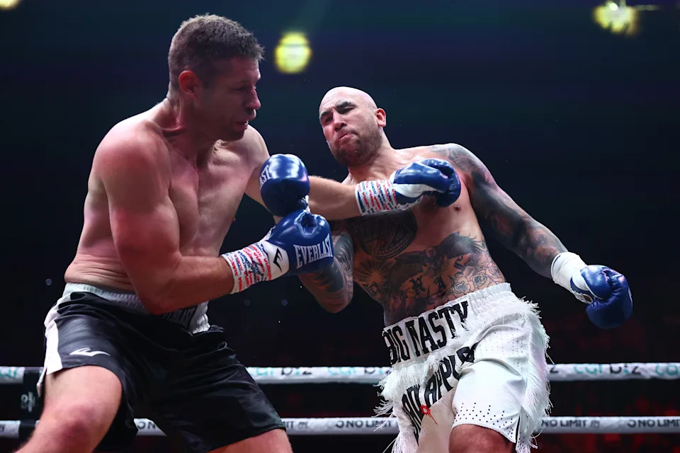 Pictured right to left, Nelson Asofa-Solomona lands a brutal uppercut on Jeremy Latimore to win his pro boxing debut in a first-round KO. 