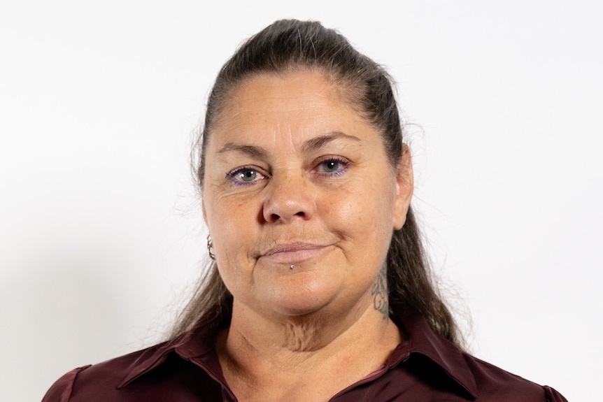 Headshot of Rennee Turner with white background.