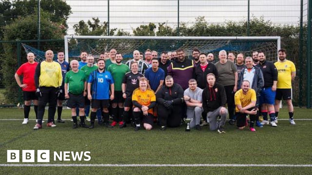 Guildford Man v Fat football club wins national team award