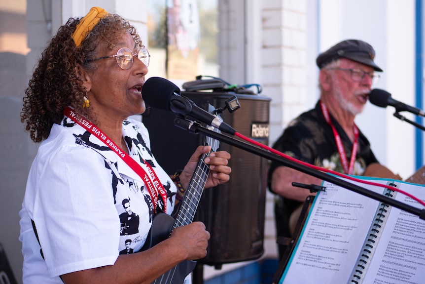 People singing and dancing at the Parkes Elvis Festival.