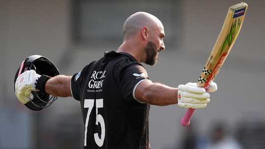 daryl-mitchell-celebrates-his-100-against-india-in-indore-on-sunday