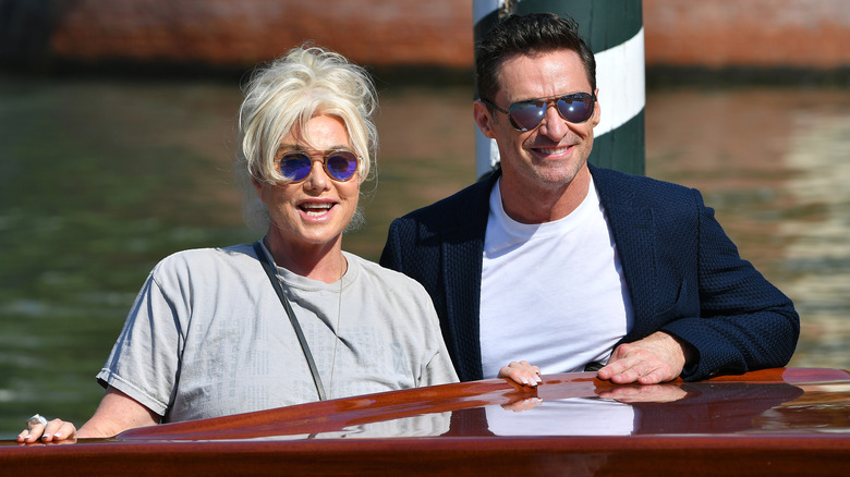 Hugh Jackman and Deborra-Lee Furness smiling on a boat