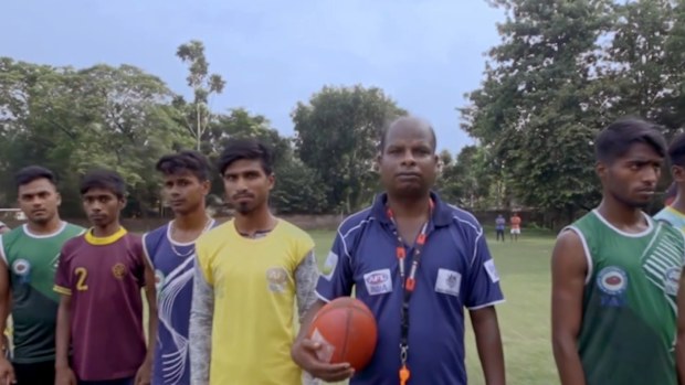 Footage of Aussie Rules being played in India.