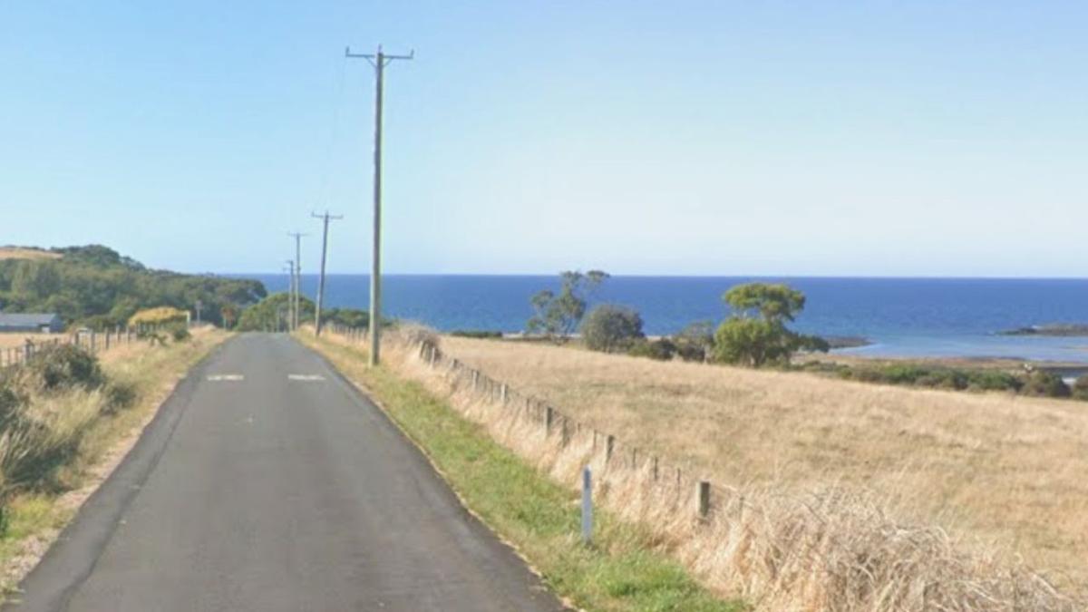 Teen boy killed riding e-bike into wooden pole in New Year’s Eve crash on coastal Tasmanian roadside