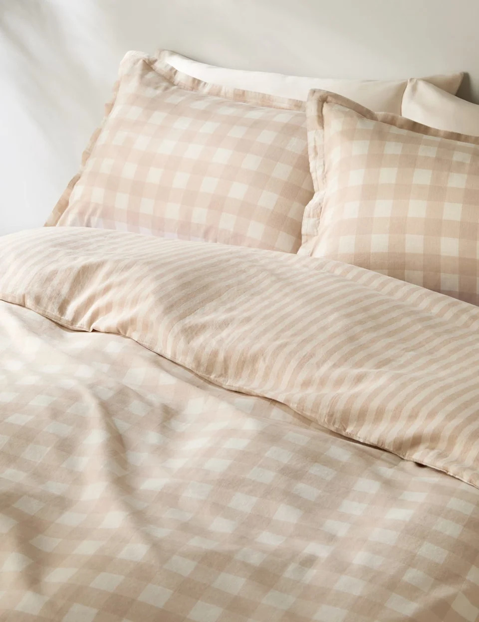 bedding set featuring a checkered duvet cover and matching pillows