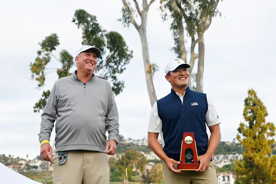 Hiroshi Tai celebrates his individual championship with head coach Bruce Heppler of the Georgia Tech Yellow Jackets after stroke play concludes during the Division I Men’s Golf Championship held at Omni La Costa Resort & Spa on May 27, 2024 in Carlsbad, California.