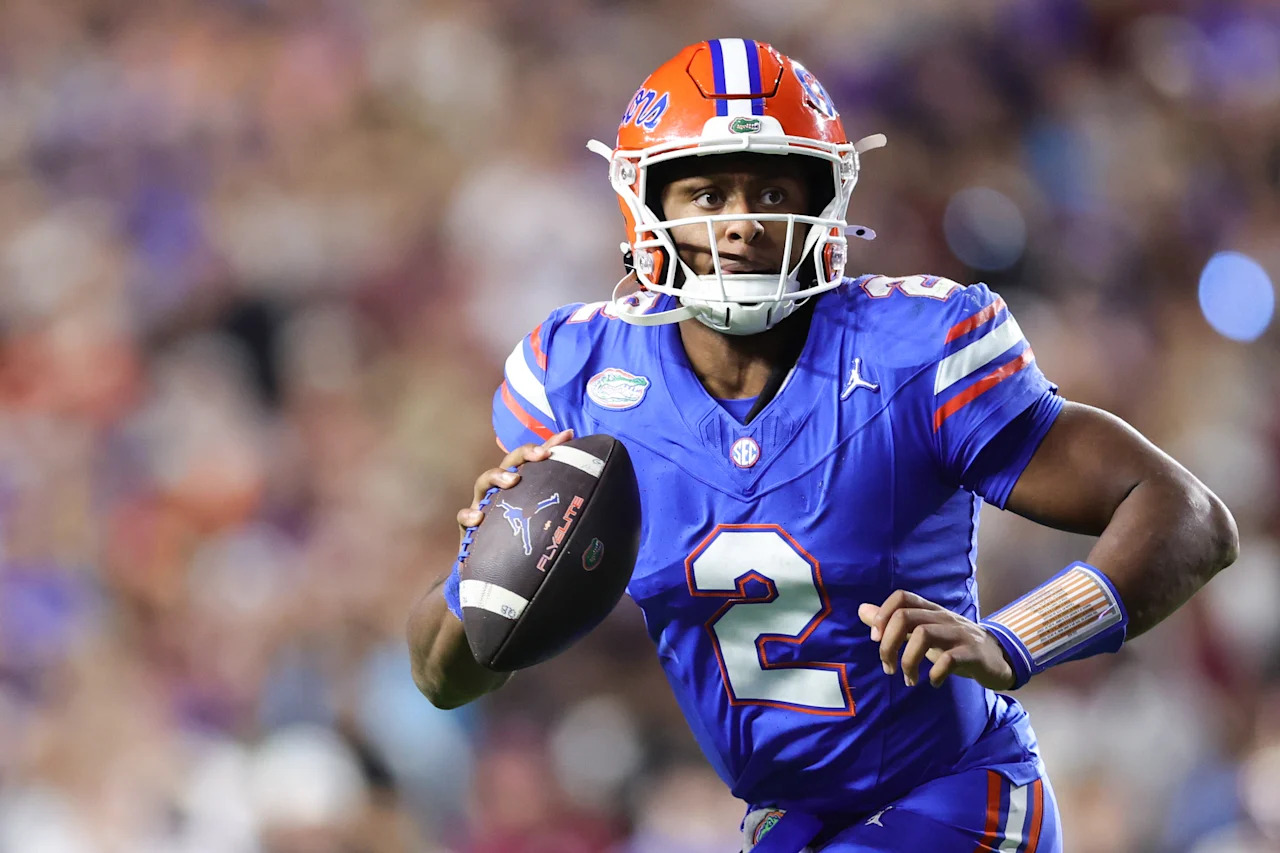 GAINESVILLE, FLORIDA - NOVEMBER 29: DJ Lagway #2 of the Florida Gators looks to pass State Seminoles during the second half of the game at Ben Hill Griffin Stadium on November 29, 2025 in Gainesville, Florida. (Photo by Megan Briggs/Getty Images)