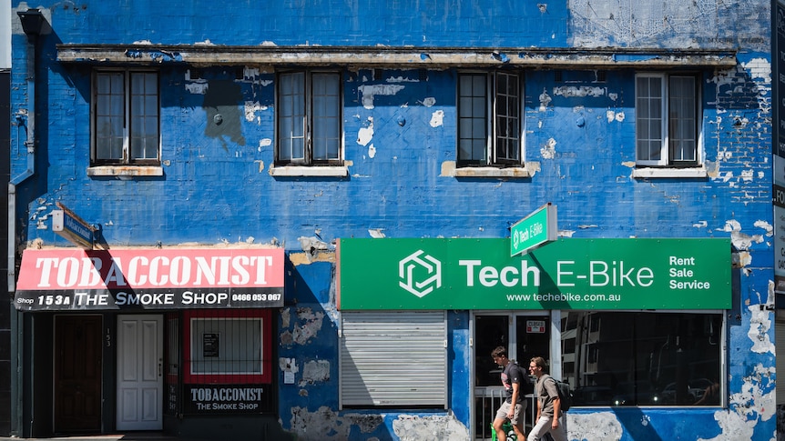 The site which was proposed for a 24 hour fast-food outlet and an impression of what the proposed McDonald's would have looked like.