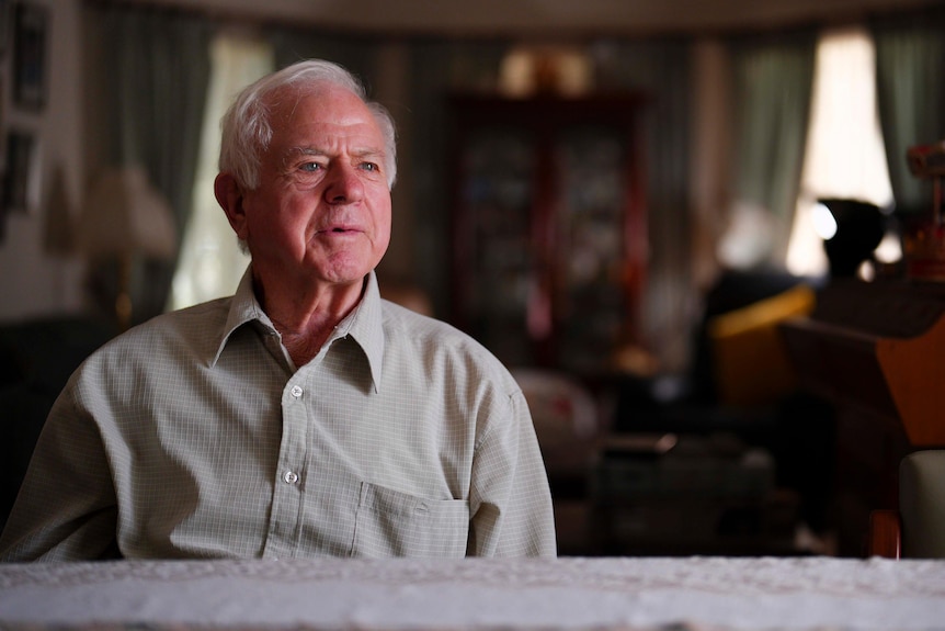A man sitting at a table.