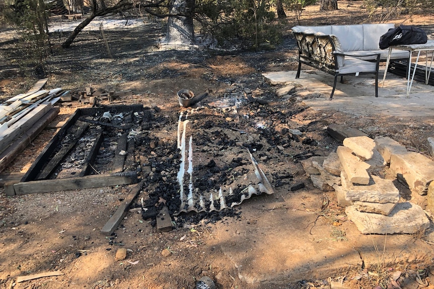 Bushfire damage around a house at Harcourt in regional Victoria.