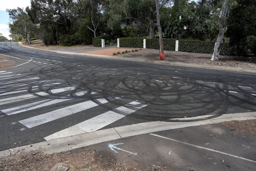 Burnout marks on a road.