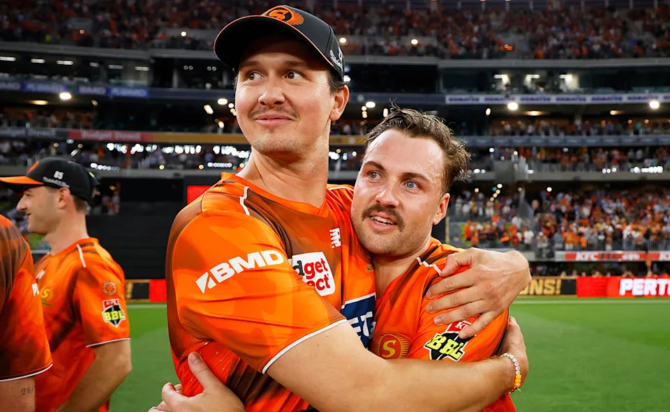 Josh Inglis, pictured here wrapping his arms around Joel Paris after the BBL final.