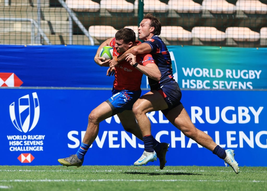 Harry Sayers (right) tackles a Chile player during Hong Kong’s disappointing Challenger Series last year. Photo: Reuters