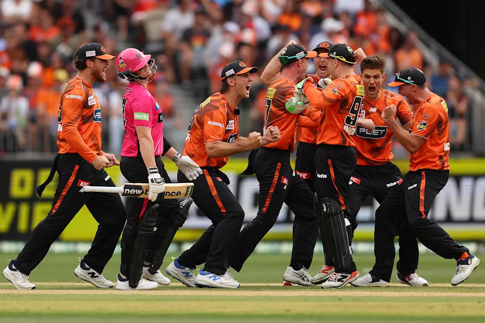 The Scorchers celebrate the wicket of Steve Smith.