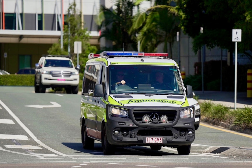 a Queensland ambulance on the road