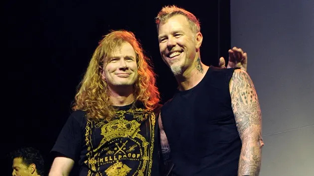 Dave Mustaine and James Hetfield of Metallica pose at Day Four of the bands' 30th Anniversary shows at The Fillmore on December 10, 2011 in San Francisco, California. (Tim Mosenfelder/WireImage)