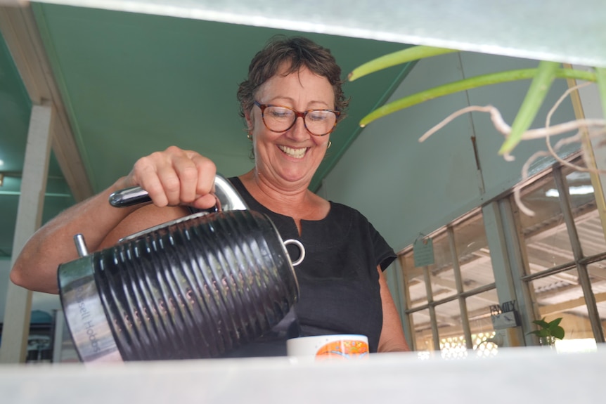 woman making cup of tea