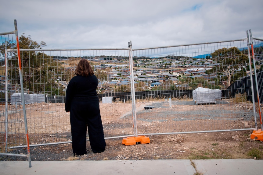Erin Bell looking at a building site.