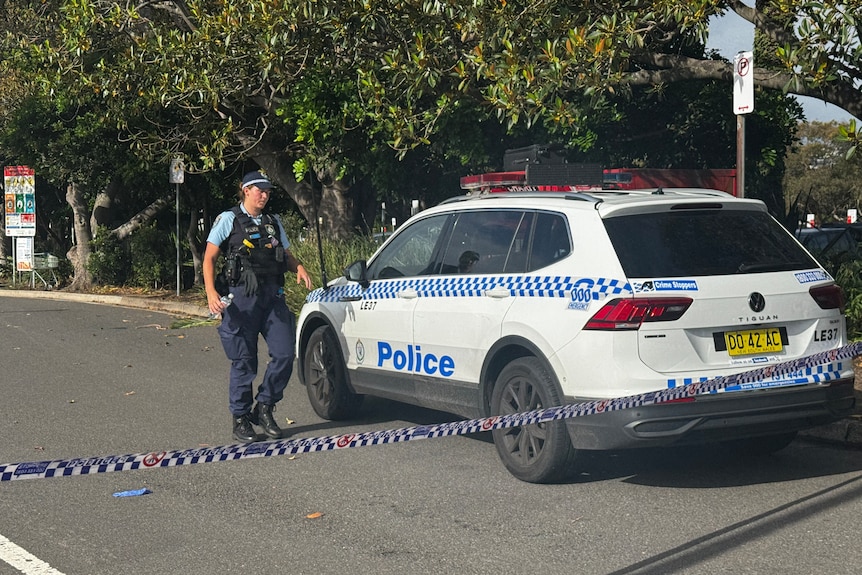 Police at the scene of a shark mauling in Sydney's eastern suburbs.