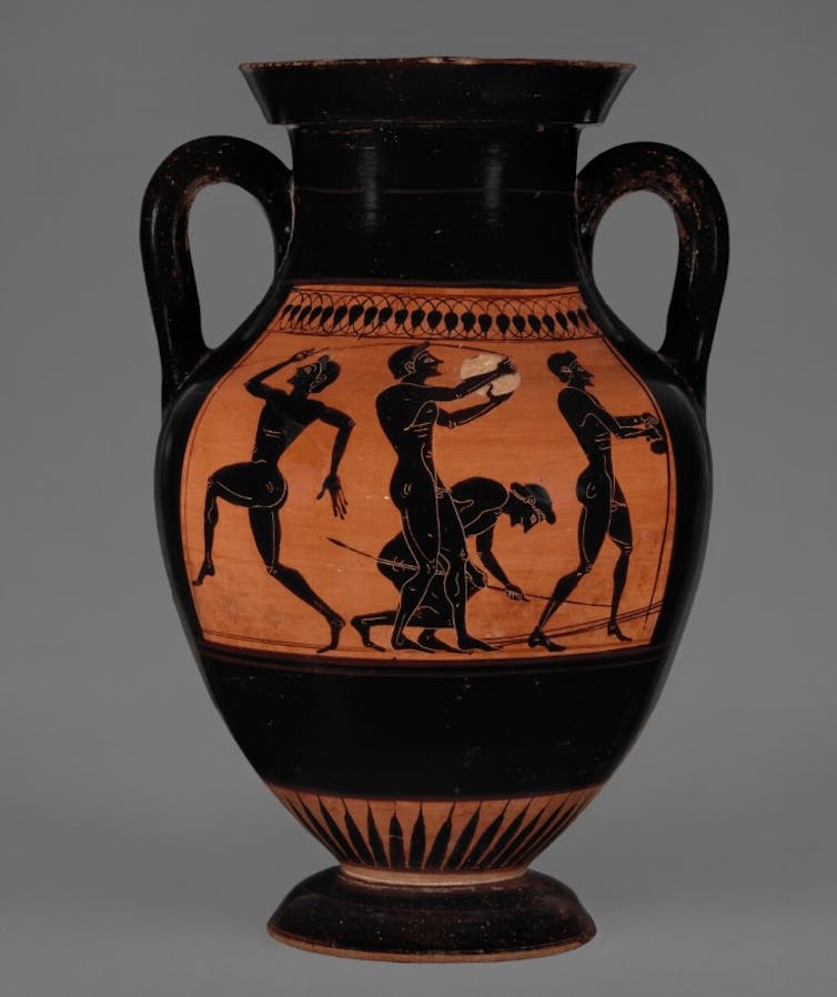 Black figures on an orange background.