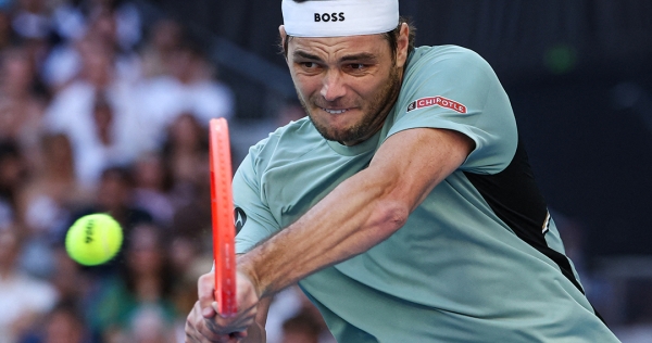 Fritz sets up Wawrinka showdown with straight-sets advance