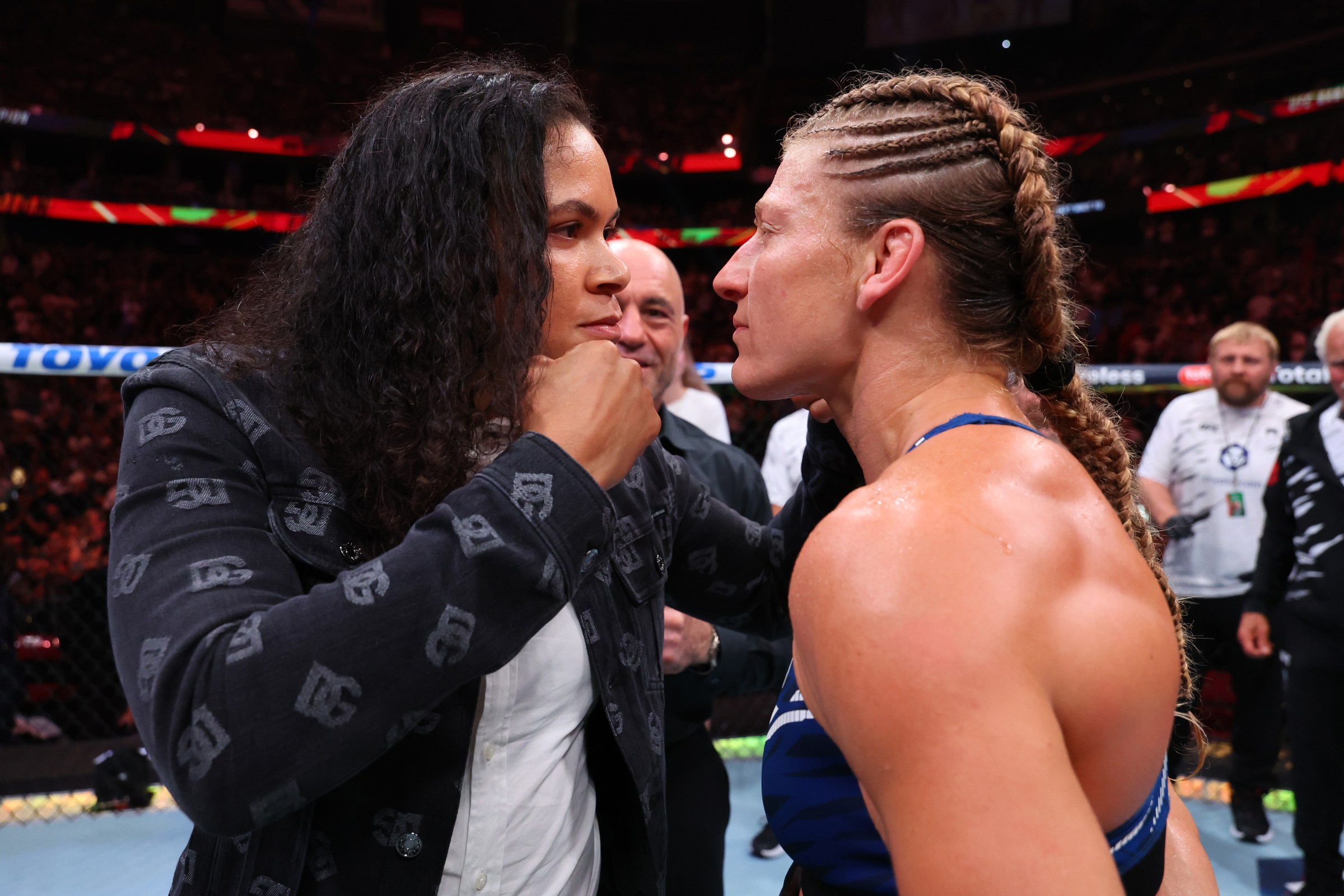 NEWARK, NEW JERSEY - JUNE 07: Kayla Harrison faces off with former champion Amanda Nunes after her victory over Julianna Pena in the UFC women’s bantamweight championship bout during the UFC 316 event at Prudential Center on June 07, 2025 in Newark, New Jersey. (Photo by Ed Mulholland/Zuffa LLC)