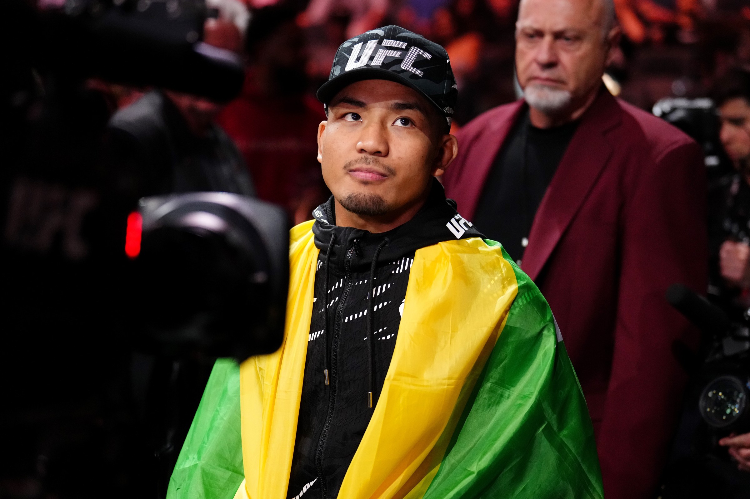 LAS VEGAS, NEVADA - JUNE 28: Joshua Van of Myanmar walks to the Octagon in a flyweight bout during the UFC 317 event at T-Mobile Arena on June 28, 2025 in Las Vegas, Nevada. (Photo by Chris Unger/Zuffa LLC)