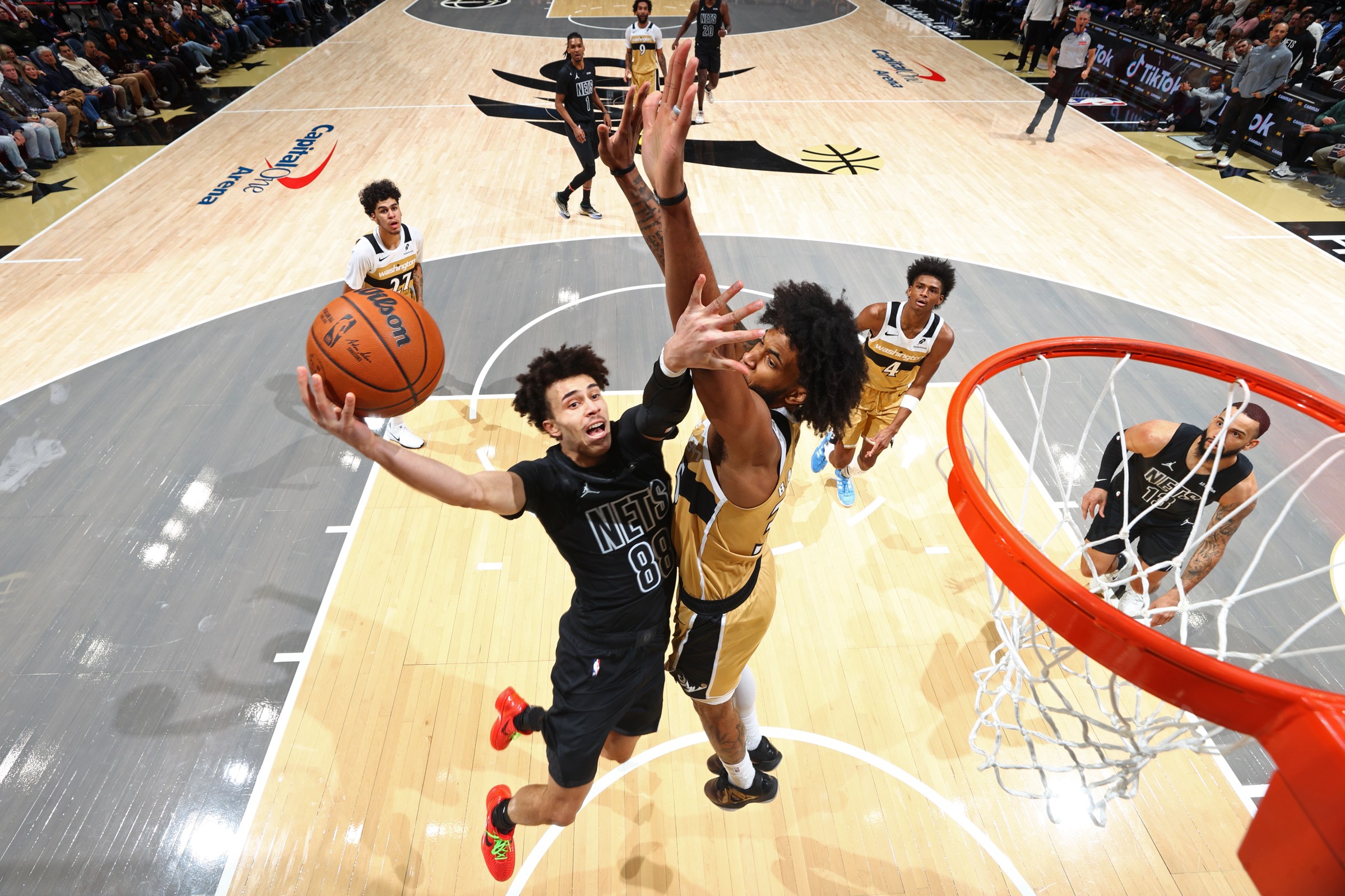 WASHINGTON, DC -  JANUARY 2: Nolan Traore #88 of the Brooklyn Nets drives to the basket during the game against the Washington Wizards on January 2, 2026 at Capital One Arena in Washington, DC. NOTE TO USER: User expressly acknowledges and agrees that, by downloading and or using this Photograph, user is consenting to the terms and conditions of the Getty Images License Agreement. Mandatory Copyright Notice: Copyright 2025 NBAE (Photo by Stephen Gosling/NBAE via Getty Images)