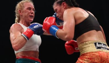 Bloody Clash Of Heads Ends Holm’s Title Bid