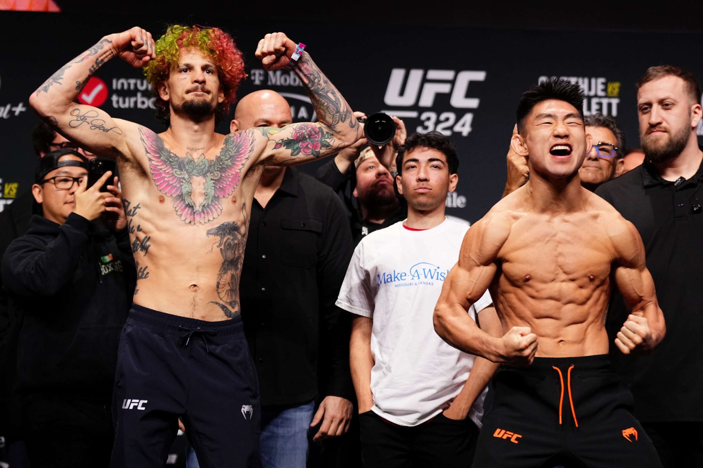 LAS VEGAS, NEVADA - JANUARY 23: (L-R) Sean O’Malley and Song Yadong of China face off during the UFC 324 ceremonial weigh-in at T-Mobile Arena on January 23, 2026 in Las Vegas, Nevada. (Photo by Jeff Bottari/Zuffa LLC)