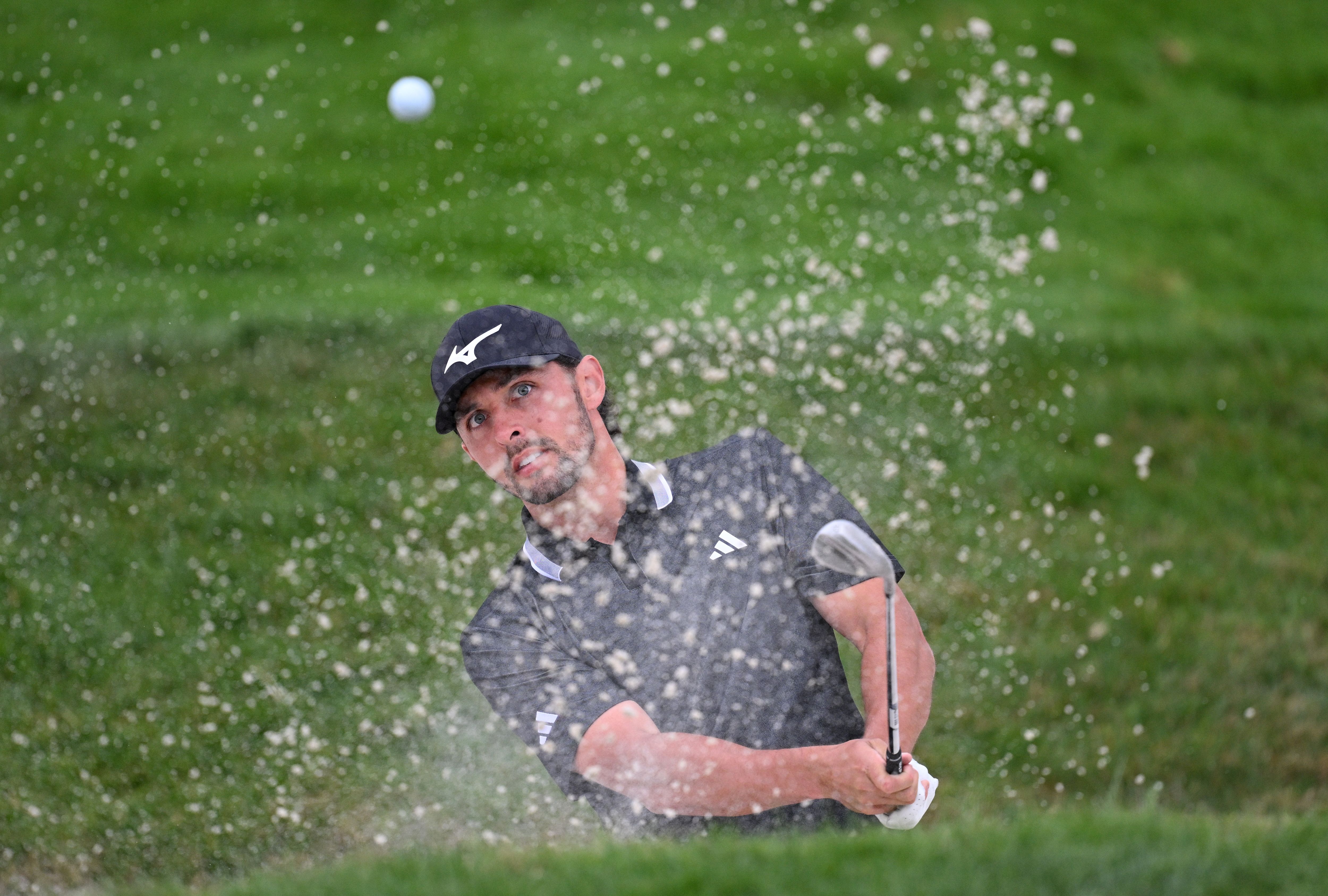 Marco Penge hits a bunker shot