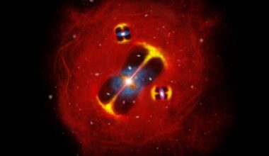 An illustration of a galaxy cluster with red swirls of gas and dust on the outside of a series of bright dots of stars