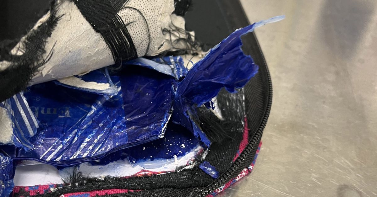 Pair charged after allegedly smuggling $32 million of heroin into Brisbane