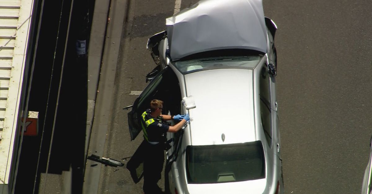 Man restrained by passersby after car crashes into multiple others on busy road