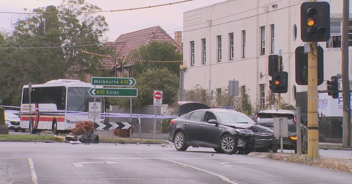 Man charged after allegedly stolen car crashes into school bus and drives at police