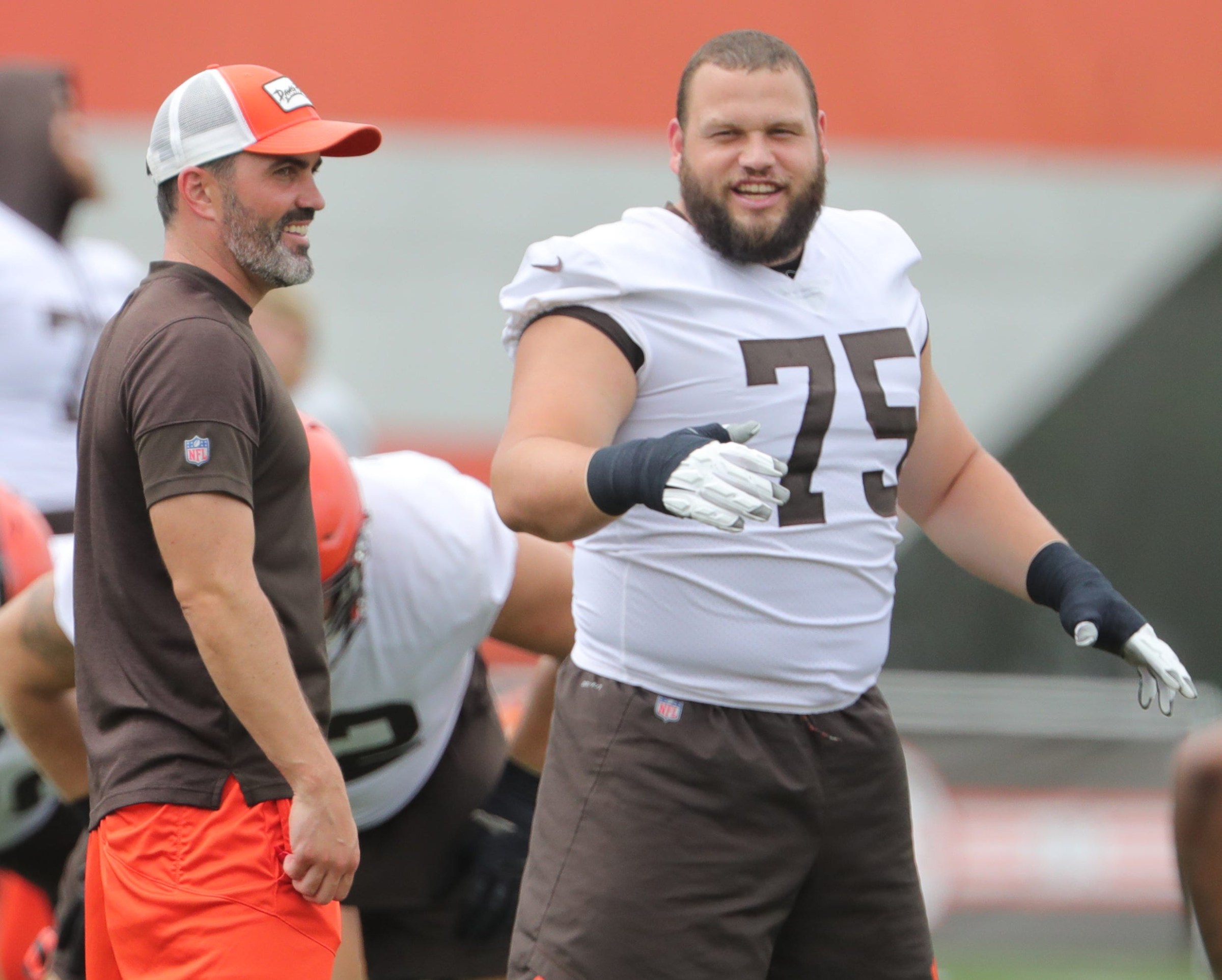 Browns head coach Kevin Stefanski talks with guard Joel Bitonio during practice on Wednesday, Aug. 18, 2021 in Berea. Browns19 1
