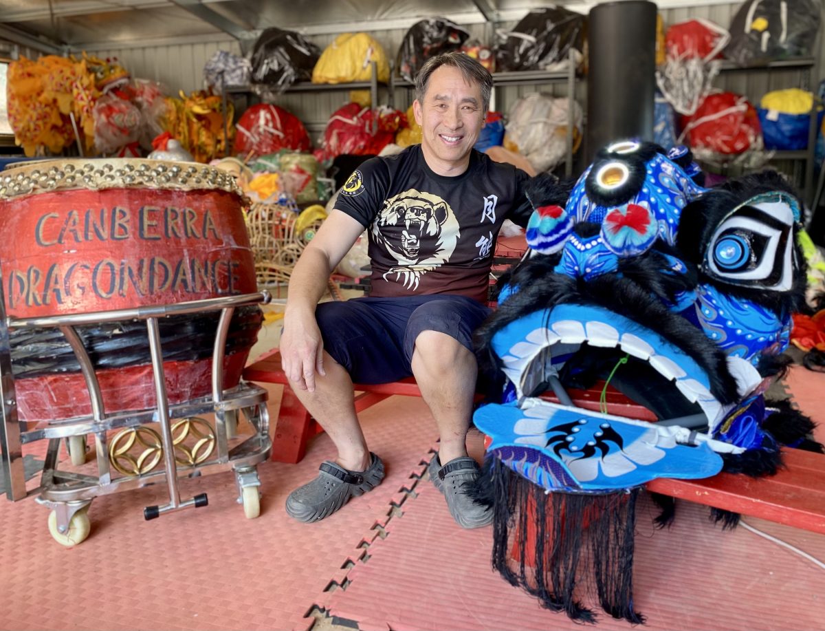 man with a Chinese lion dance costume