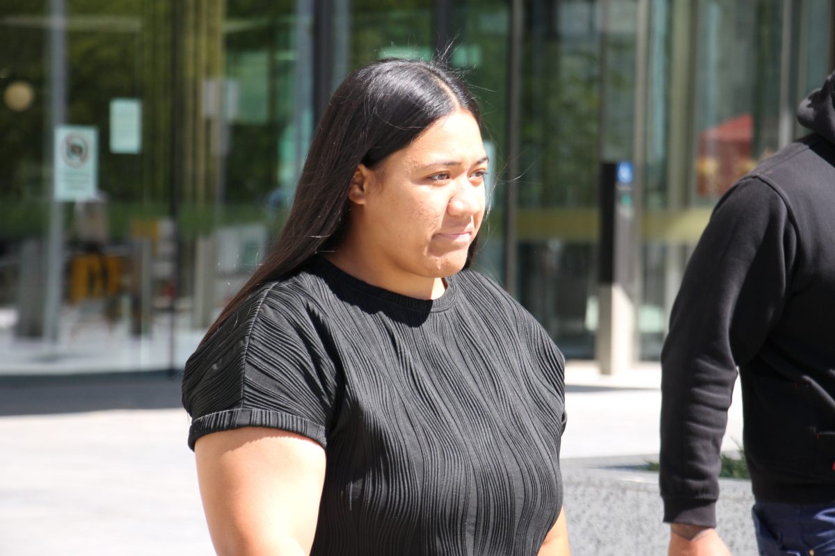 young woman leaving court
